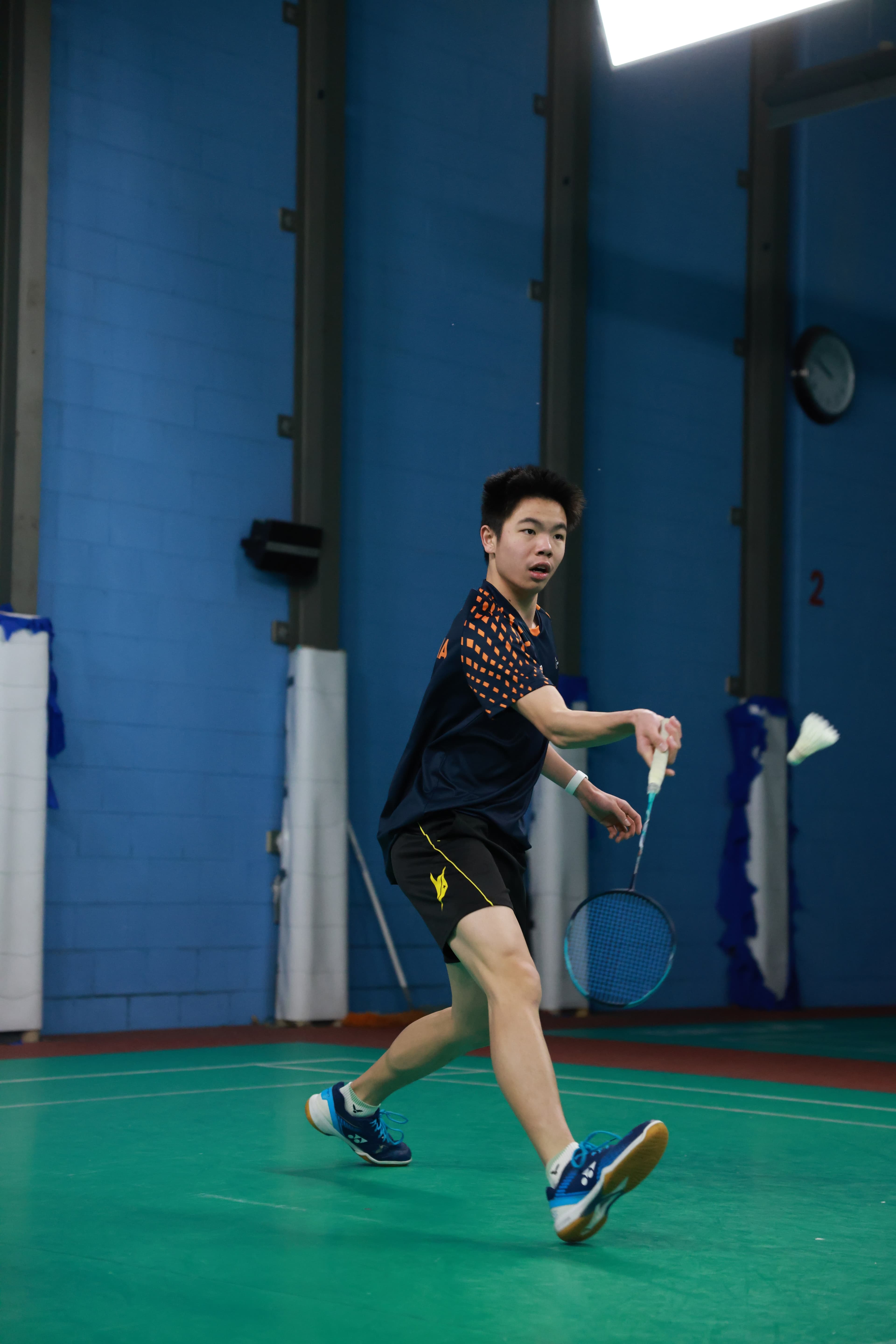 Alex playing badminton